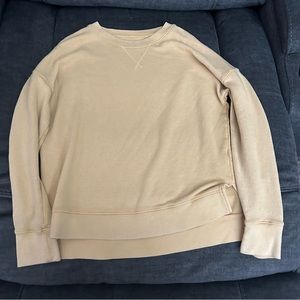 Yellow sweater with slit on both sides